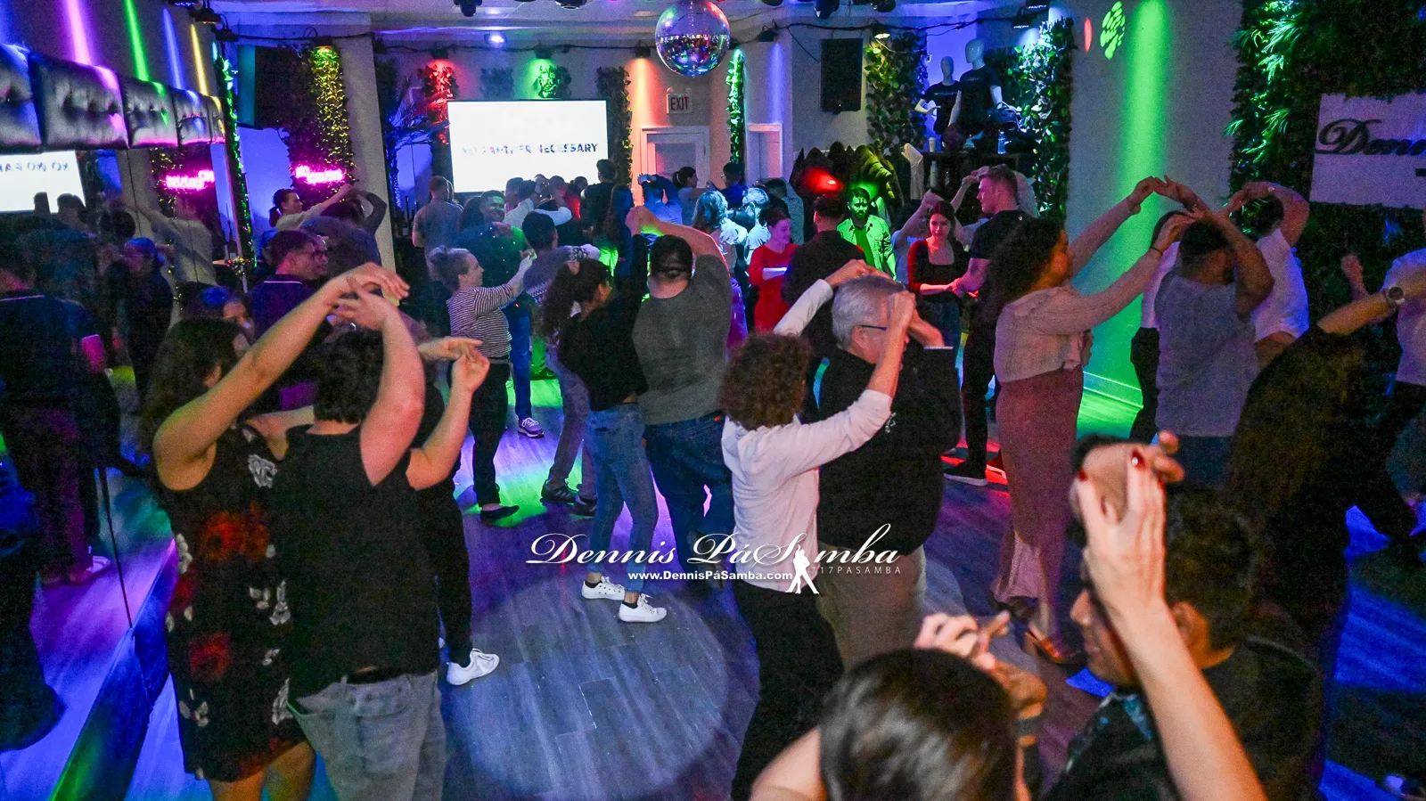 Dancers executing turn patterns at a Chicago salsa social