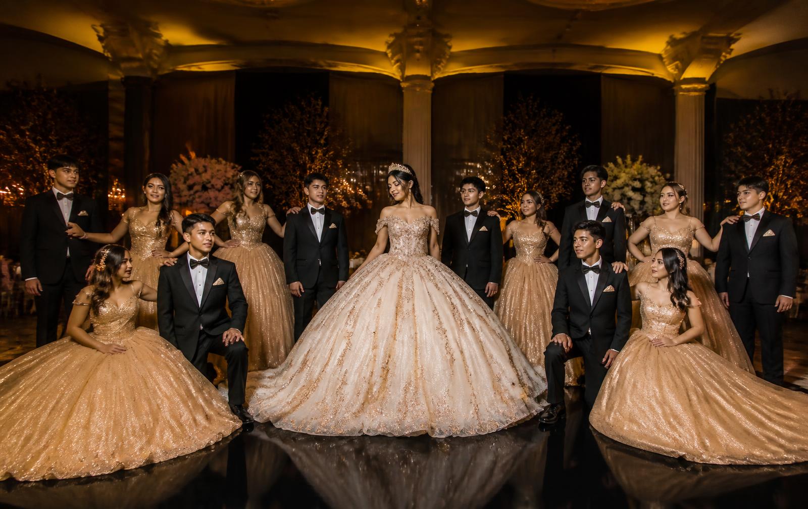 Full Quinceañera court — chambelanes and damas in a formal choreographed pose