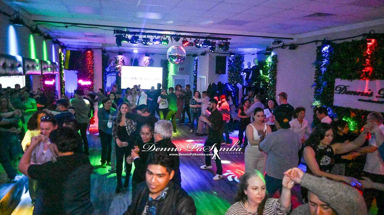 Colorful lighting over the dance floor during a Friday social